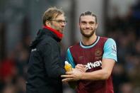 Football Soccer - West Ham United v Liverpool - Barclays Premier League - Upton Park - 2/1/16 Liverpool manager Juergen Klopp with West Ham's Andy Carroll at the end of the match Action Images via Reuters / John Sibley Livepic