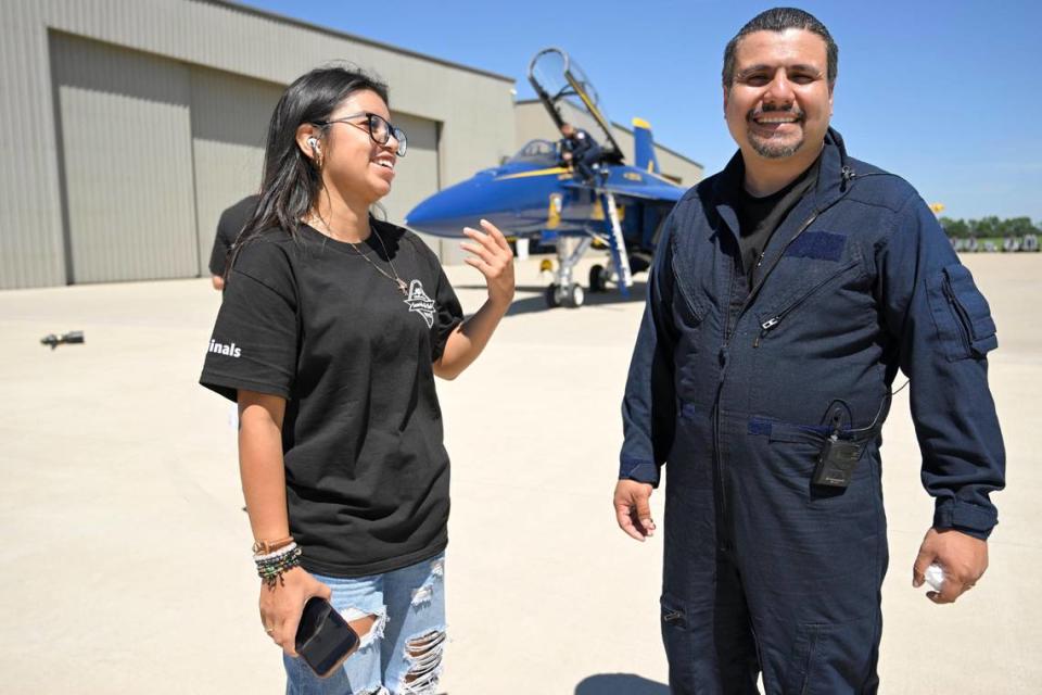 Student Stephanie Garcia-Rios, 17, greeted Erik Erazo, after his flight with the U.S. Navy Blue Angels. Tammy Ljungblad/tljungblad@kcstar.com