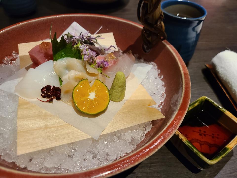 Caviar, wagyu, and abalone on plate of ice