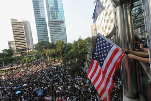 Hong Kong protesters march peacefully from Chater Garden to the US consulate, hoping to increase foreign pressure on Beijing