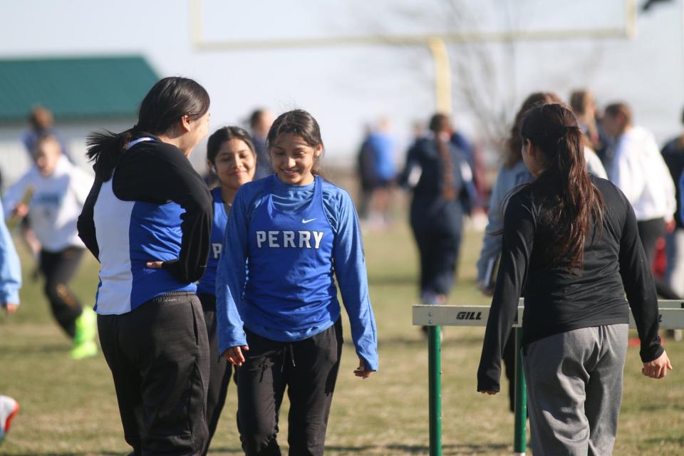 A Perry athletes compete during the Cavanaugh Relays on Thursday, April 6, 2023, at Hawk Stadium in Woodward.