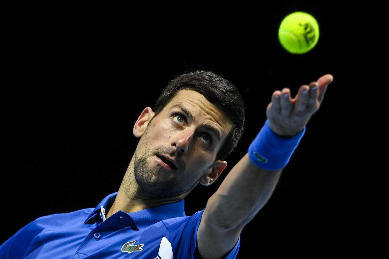 LONDON, ENGLAND - NOVEMBER 21: Novak Djokovic of Serbia serves against Dominic Thiem of Austria during Day 7 of the Nitto ATP World Tour Finals at The O2 Arena on November 21, 2020 in London, England. (Photo by TPN/Getty Images)