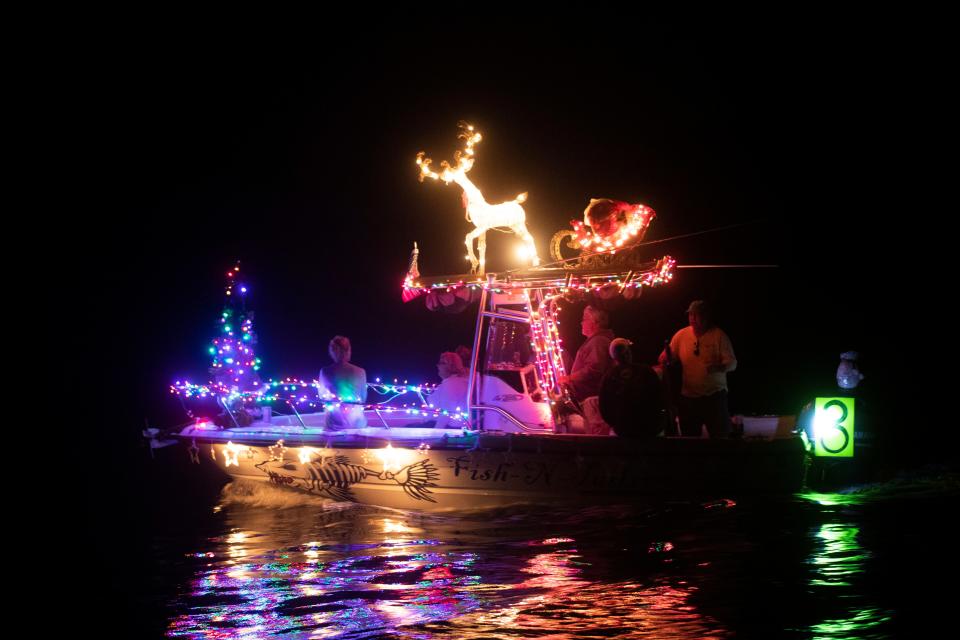 Boats participate in the Fort Myers Beach Boat Parade on Saturday, Dec. 4, 2021. 