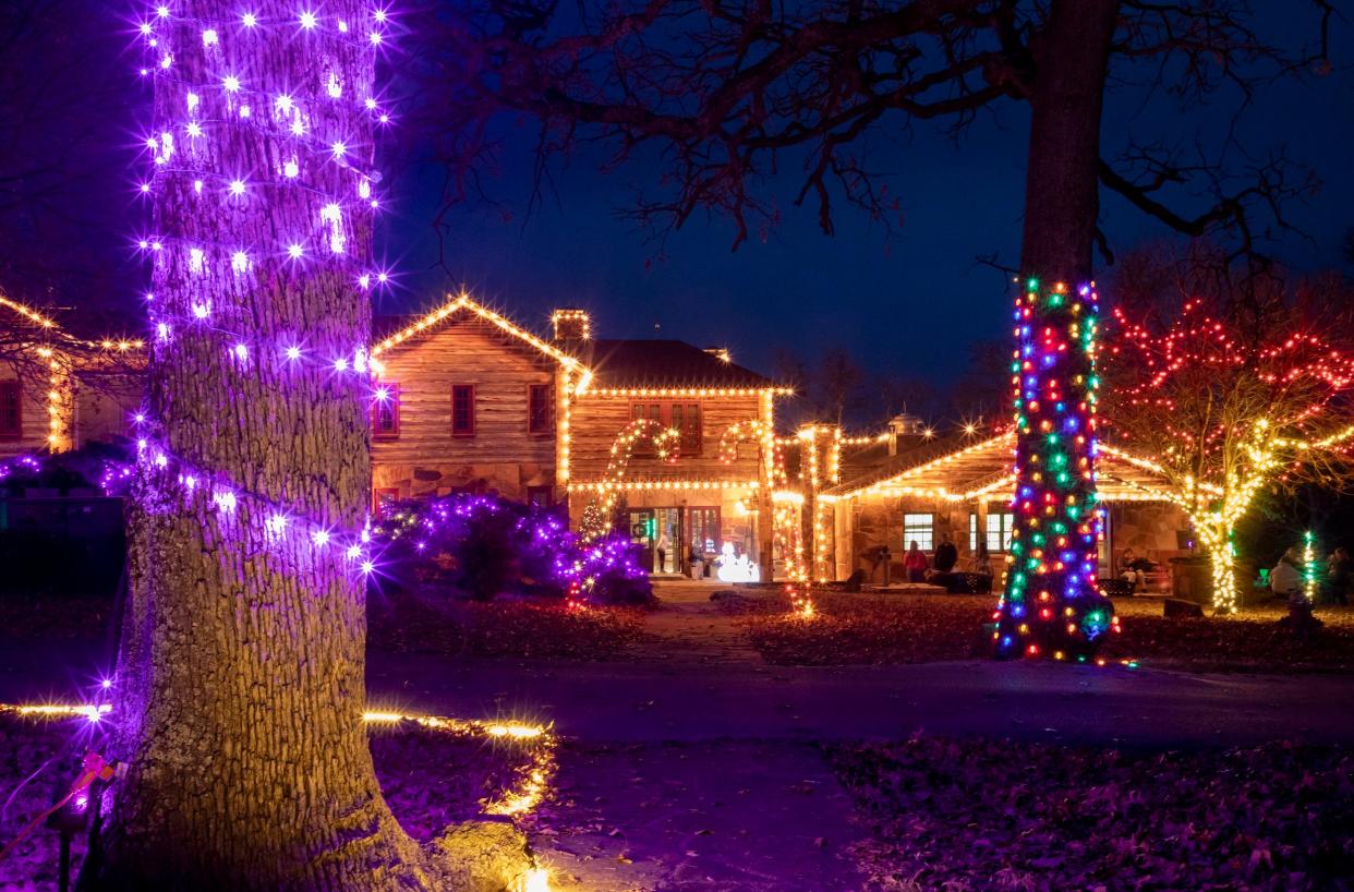 The grounds and buildings of the Woolaroc Museum & Wildlife Preserve in Bartlesville are covered with more than 750,000 lights during Woolaroc's Wonderland of Lights.