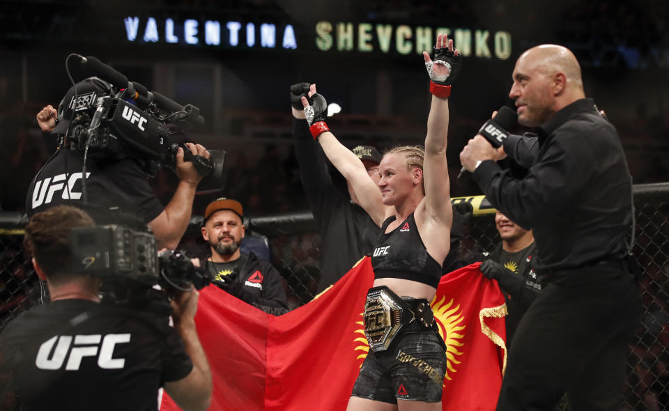 Valentina Shevchenko celebrates after defeating Jessica Eye during their women's flyweight title mixed martial arts bout at UFC 238, Saturday, June 8, 2019, in Chicago. (AP Photo/Kamil Krzaczynski)