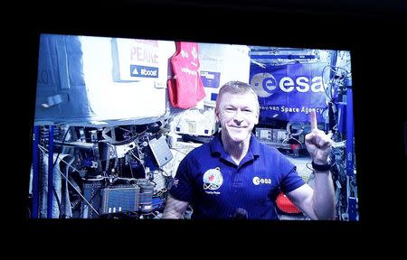 Athletics - 2016 Virgin Money London Marathon Preview - London - 20/4/16 British European Space Agency (ESA) astronaut Tim Peake appears live from the International Space Station for a questions and answers session with assembled media ahead of the 2016 Virgin Money London Marathon Action Images via Reuters / Peter Cziborra Livepic