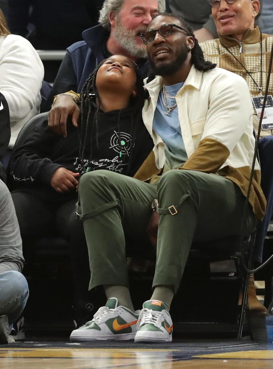 Former Marquette basketball star and current Phoenix Suns player Jae Crowder is shown during the first half of the Marquette-St.  John's game on Saturday, March 5, 2022 at the Fiserv Forum in Milwaukee.  Crowder has not played this season.