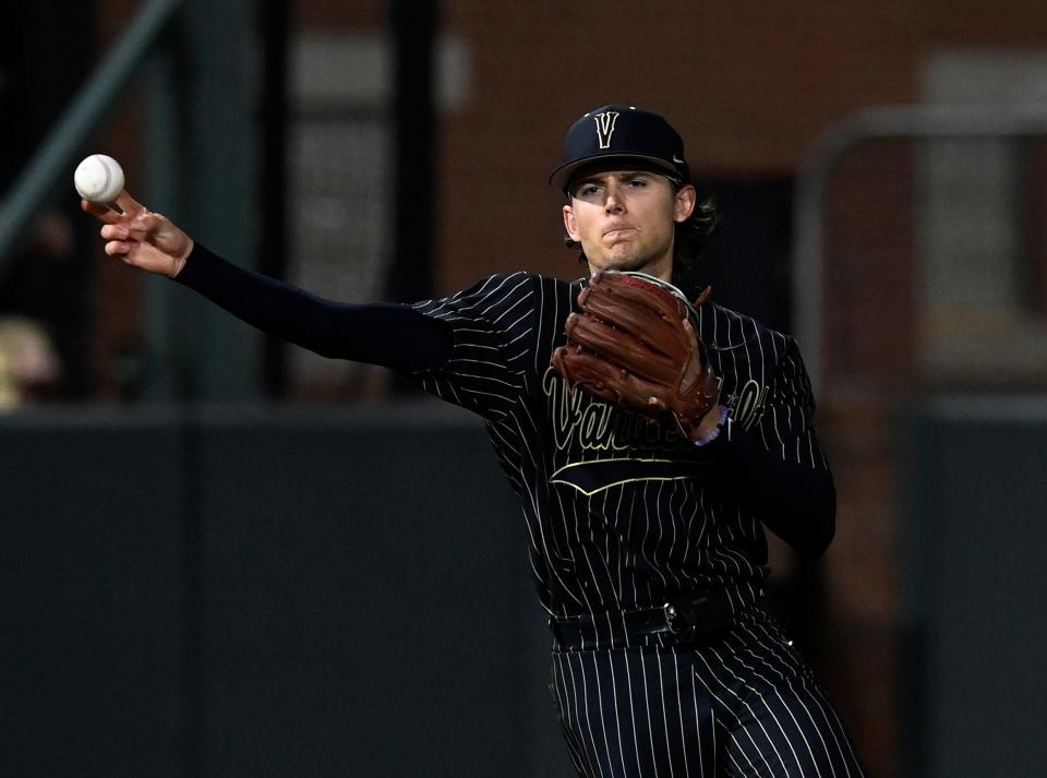 Vanderbilt shortstop Carter Young throws out a Florida based runner during the sixth inning of an NCAA college baseball game Friday, April 15, 2022, in Nashville, Tenn. 