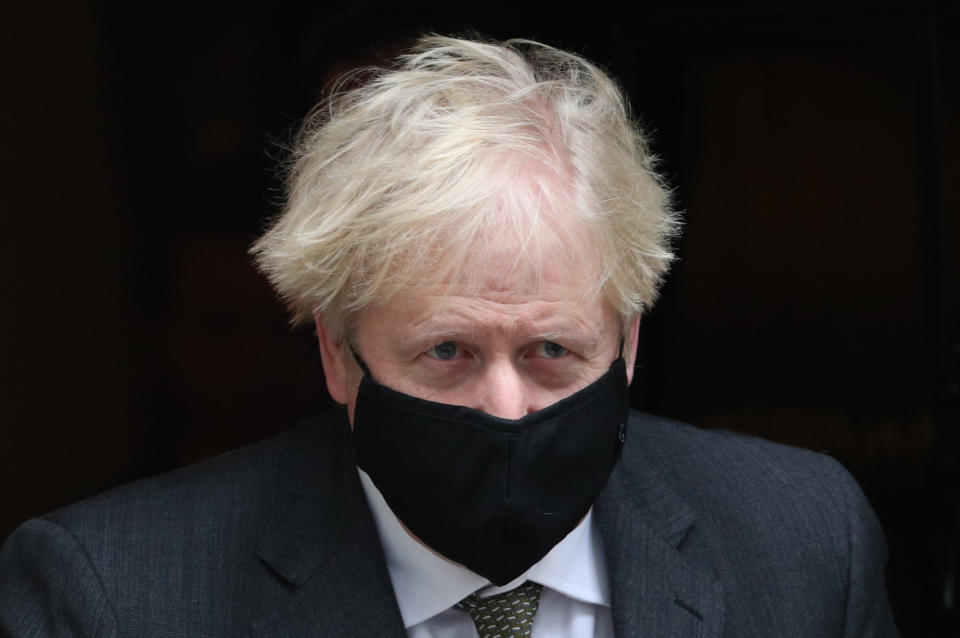 Prime Minister Boris Johnson leaves 10 Downing Street to attend Prime Minister's Questions at the Houses of Parliament, London.