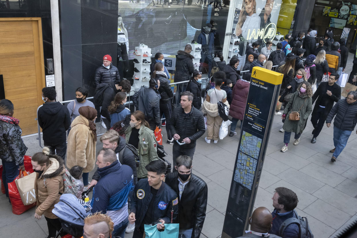 On the day that the UK government eased Covid restrictions to allow non-essential businesses such as shops, pubs, bars, gyms and hairdressers to re-open, crowds of shoppers walk on Oxford Street, on 12th April 2021, in London, England. (Photo by Richard Baker / In Pictures via Getty Images)