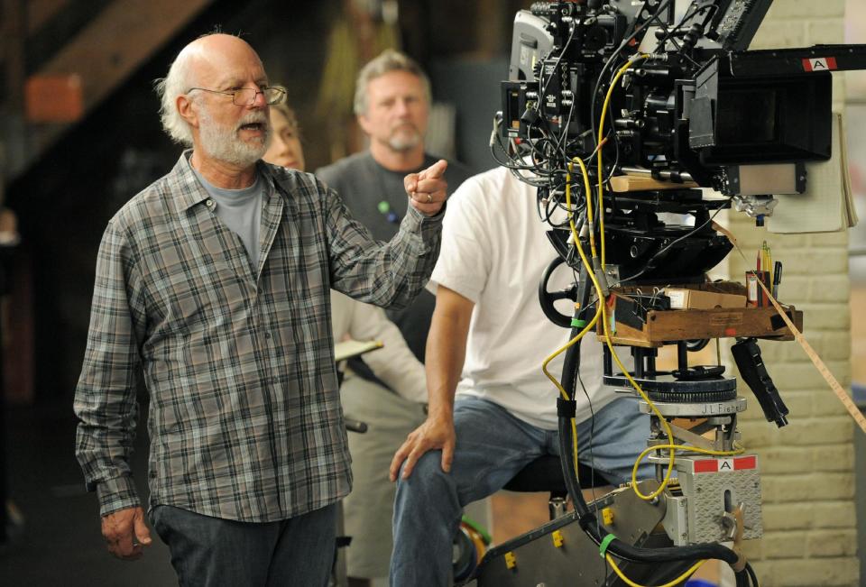 James Burrows, director of the television series "Partners," blocks out a scene for the show on Wednesday, Sept. 19, 2012, at Warner Bros. Studios in Burbank, Calif. Burrows isn't a household name. But behind the scenes Burrows reigns as a comedy giant. He's a director whose brand of funny business has helped shape TV comedy season after season. (Photo by Chris Pizzello/Invision/AP)