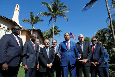 Standing with other Caribbean leaders, Jamaica Prime Minister Andrew Holness speaks after a meeting with U.S. President Donald Trump at Mar-a-Lago in Palm Beach, Florida, U.S., March 22, 2019. REUTERS/Kevin Lamarque