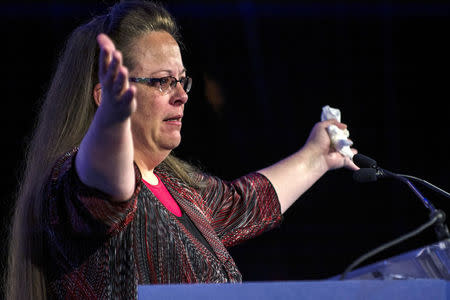 FILE PHOTO: Kentucky's Rowan County Clerk Kim Davis, who was briefly jailed for refusing to issue marriage licenses to same-sex couples, makes remarks after receiving the "Cost of Discipleship" award at a Family Research Council conference in Washington September 25, 2015. REUTERS/James Lawler Duggan/File Photo