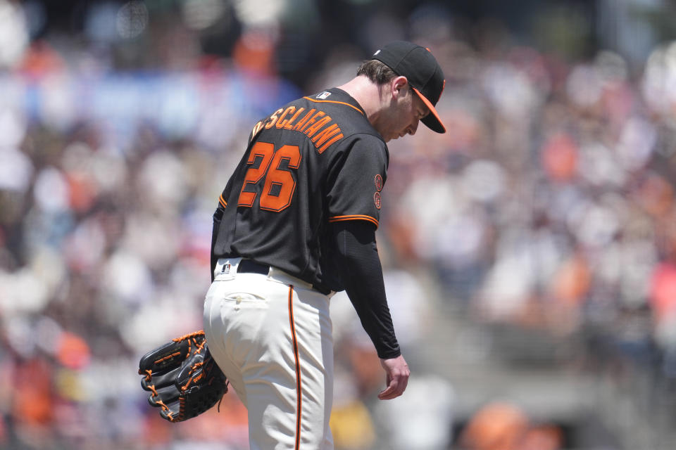 San Francisco Giants pitcher Anthony DeSclafani reacts after hitting Baltimore Orioles' James McCann with a pitch during the third inning of a baseball game in San Francisco, Sunday, June 4, 2023. (AP Photo/Jeff Chiu)