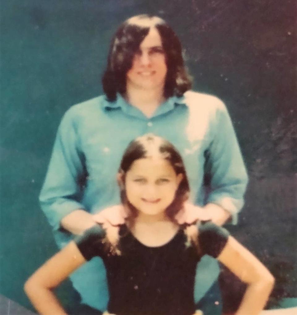 Angela Barrett with her father Warren in an old family photo. Warren, who graduated from Coral Park High in 1967, first begun exhibiting signs of mental illness by age 19. After years of hospitalization, he was murdered at age 72 by a fellow patient at the Northeast Florida State Hospital. The killer had been placed there under a state policy that ‘steps down’ patients with violent criminal histories into facilities not designed to house them.