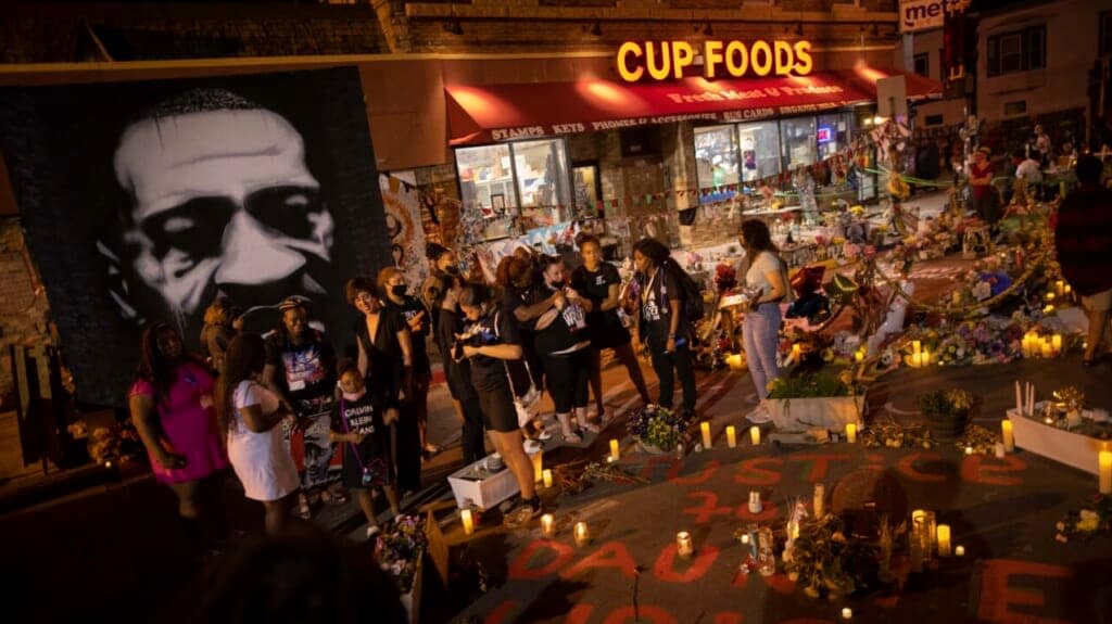 FILE – The family of Daunte Wright gathers on the one-year anniversary of George Floyd’s death, May 25, 2021, in Minneapolis. A candlelight vigil to honor Floyd’s memory at the intersection where he died was among the remembrances scheduled for Wednesday’s second anniversary of the Black man’s killing at the hands of Minneapolis police officers. (AP Photo/Christian Monterrosa, File)