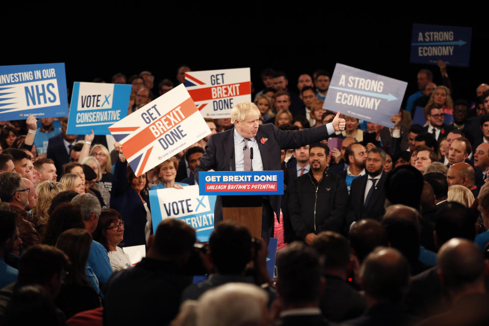 Britain's Prime Minister Boris Johnson speaks during an election campaign event for his ruling Conservative Party at the NEC, (National Exhibition Centre) in Birmingham, England, Wednesday, Nov. 6, 2019. Britain goes to the polls on Dec. 12. (AP Photo/Frank Augstein)