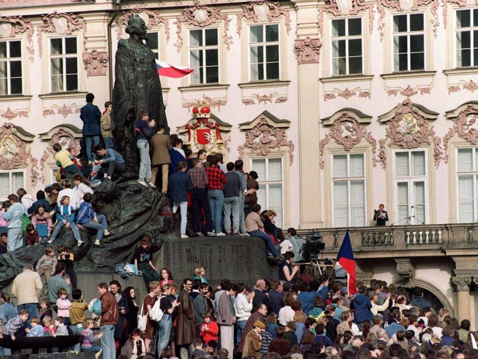 Vaclav Havel addresses supporters from the balcony of the Kinsky Palace at the Old City Square on 23 February 1990 in the wake of his victory (Lubomir Kotek/AFP/Getty)