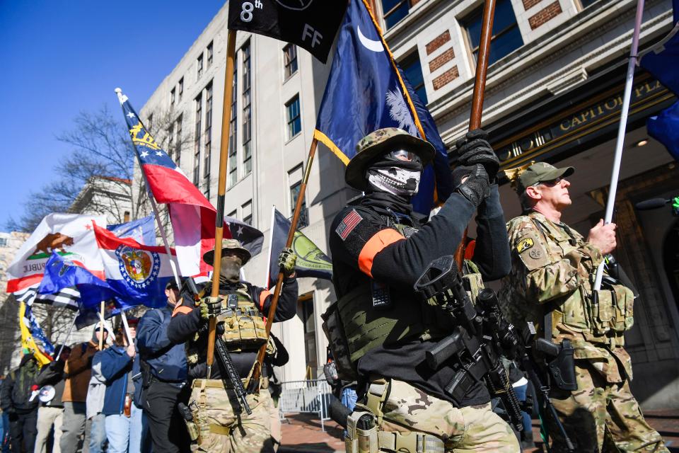 Gun rights advocates and members of unauthorized militias gather in Virginia's Capitol to protest proposed gun control legislation.