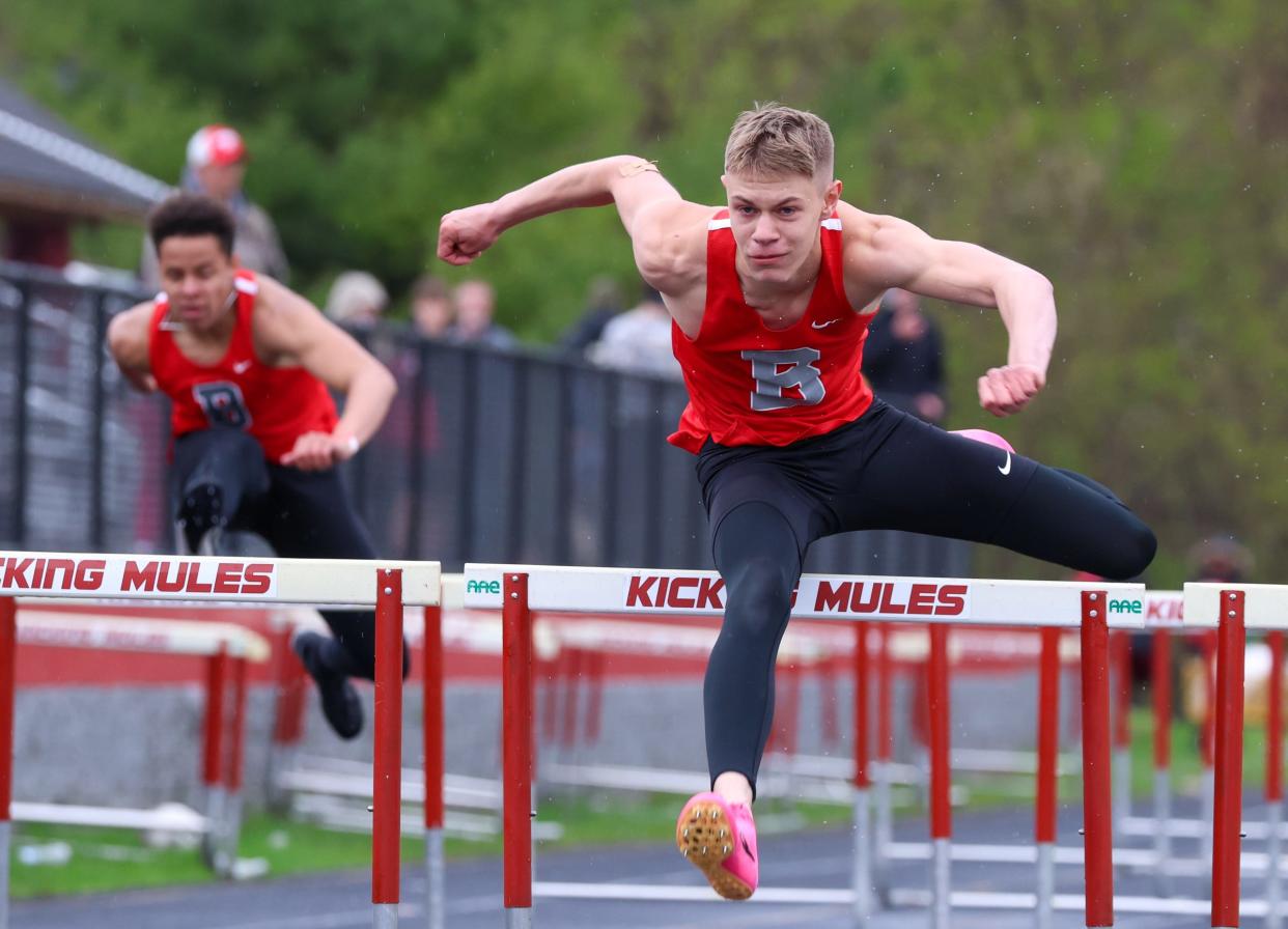 Sawyer Ulery of Bedford, shown during a dual meet against Monroe last season, won both hurdle races in the Southeastern Conference Indoor Track and Field Meet Thursday.