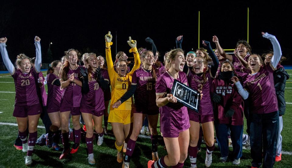 The Algonquin Regional High School girls soccer team celebrates with the Central Mass Athletic Directors Association Class A girls soccer championship, defeating Shrewsbury, 1-0, at the Assabet Valley Regional High School field, Nov. 1, 2023.