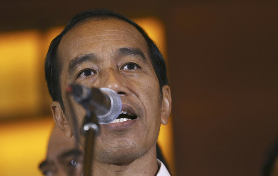 Indonesian President Joko Widodo delivers a speech during a press conference in Jakarta, Indonesia, Wednesday, April 17, 2019. Widodo is on track to win a second term, preliminary election results showed Wednesday, in apparent victory for moderation over the ultra-nationalistic rhetoric of his rival Prabowo Subianto. (AP Photo/Achmad Ibrahim)