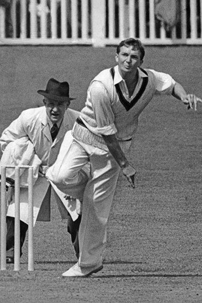 Richie Benaud takes on the MCC in the first innings in Brisbane.