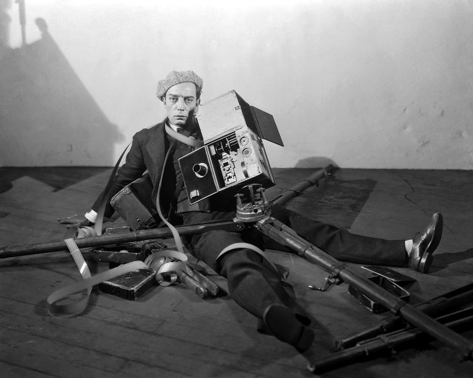 Actor and director Buster Keaton poses for a portrait on the set of his MGM film "The Cameraman"