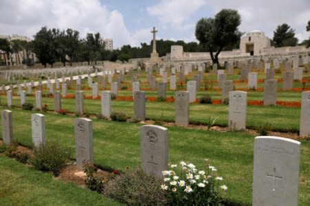 Tombstones are seen at the Commonwealth War Graves Cemetery in Jerusalem, June 13, 2018. Picture taken June 13, 2018. REUTERS/Ronen Zvulun