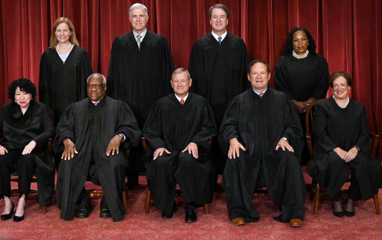 The U.S. Supreme Court in its official portrait on Oct. 7, 2022. <a href="https://www.gettyimages.com/detail/news-photo/justices-of-the-us-supreme-court-pose-for-their-official-news-photo/1243795466?phrase=us%20supreme%20court%20justices&adppopup=true" rel="nofollow noopener" target="_blank" data-ylk="slk:Olivier Douliery/AFP via Getty Images;elm:context_link;itc:0;sec:content-canvas" class="link ">Olivier Douliery/AFP via Getty Images</a>