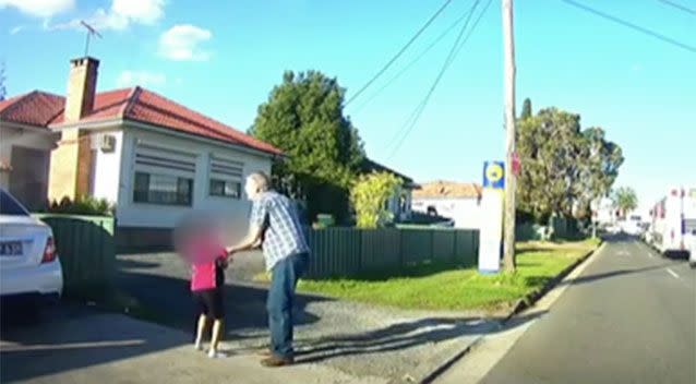 The dashcam captures the moment the toddler is safely returned to a youth relative. Source: 7 News