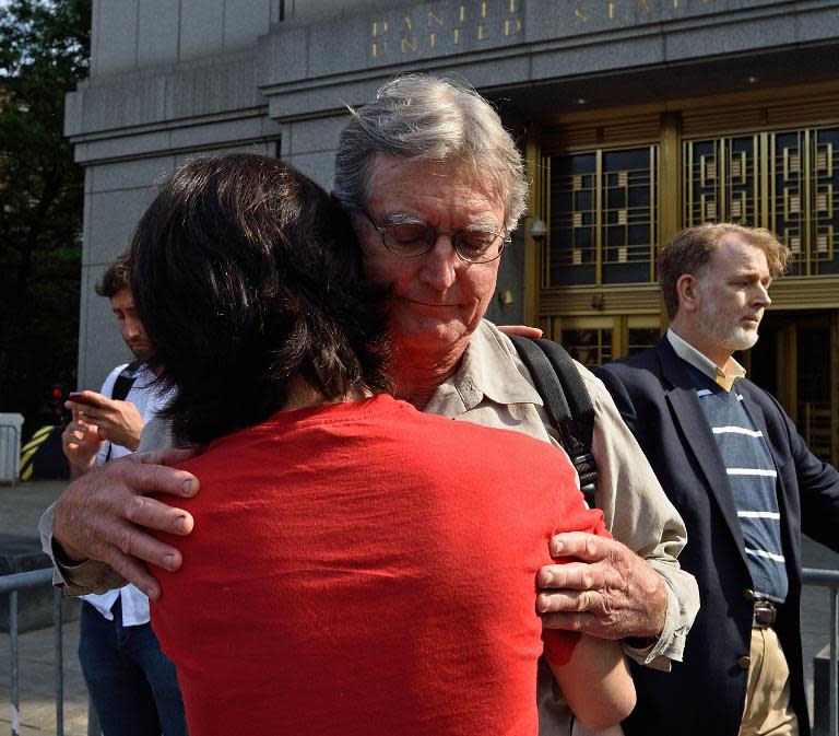 Kirk Ulbricht -- the father of Silk Road founder Ross Ulbricht -- hugs a friend outside the Federal Courthouse in New York, on May 29, 2015