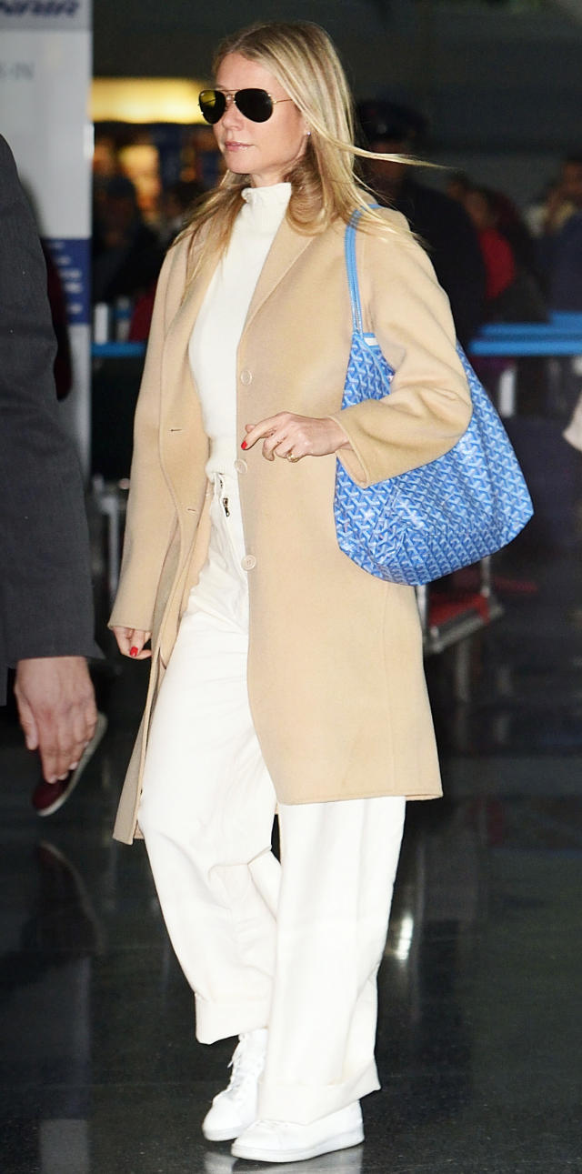 selena gomez rocks a beige turtleneck with a louis vuitton trench