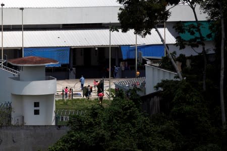 Migrants are seen inside the Siglo XXI immigration facility in Tapachula