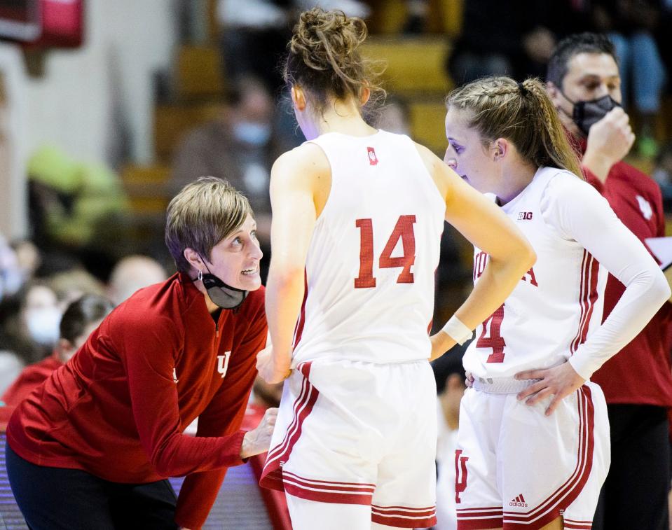 Indiana head coach Teri Moren instructs Ali Patberg (14) and Nicole Cardaño-Hillary (4) during the first half of the Indiana versus Maryland women's basketball game at Simon Skjodt Assembly Hall on Sunday, Jan. 2, 2022.