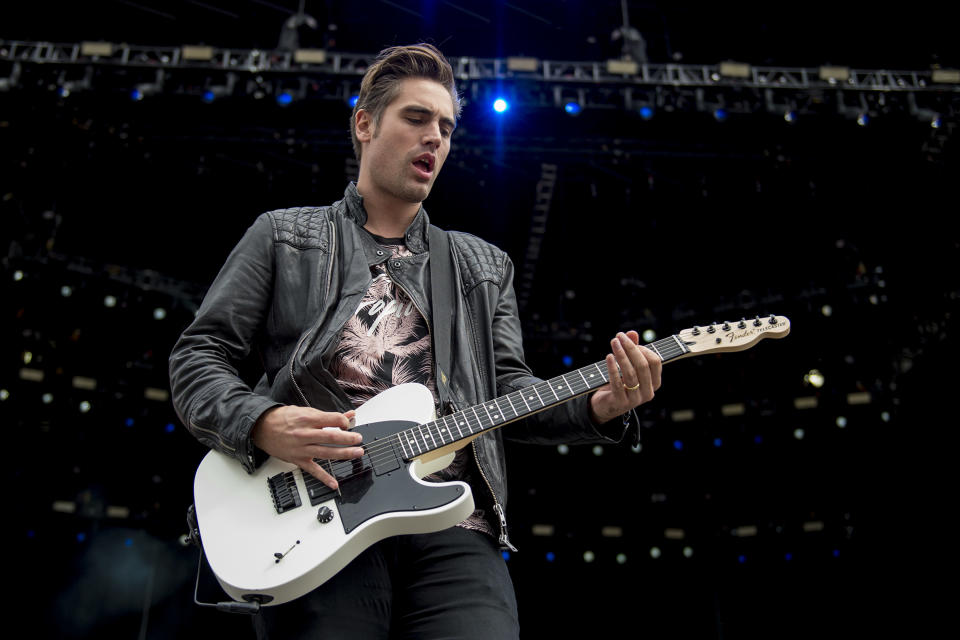 CHELMSFORD, ENGLAND - AUGUST 19: (EDITORIAL USE ONLY): Charlie Simpson of Busted performs live on stage during V Festival 2017 at Hylands Park on August 19, 2017 in Chelmsford, England. (Photo by Neil Lupin/Redferns)