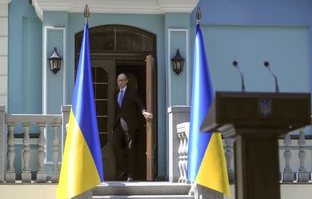 Ukraine's Prime Minister Arseny Yatseniuk arrives for a news briefing in Kiev July 31, 2014. REUTERS/Andrew Kravchenko/Pool