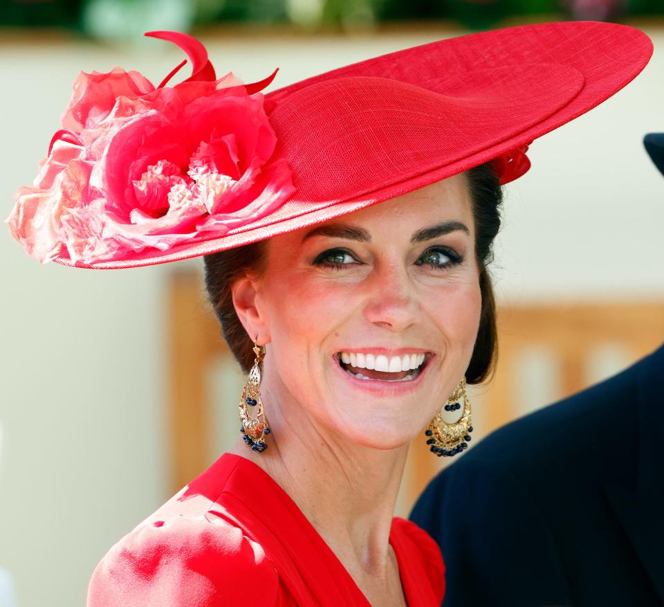 Kate Middleton in a bright-red hat at Royal Ascot 2023.