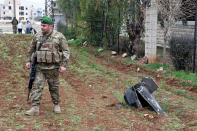 <p>A Lebanese soldier secures the area around a part of a missile in Ali al Nahri, Lebanon, Feb. 10, 2018. (Photo: Hasan Abdallah/Reuters) </p>