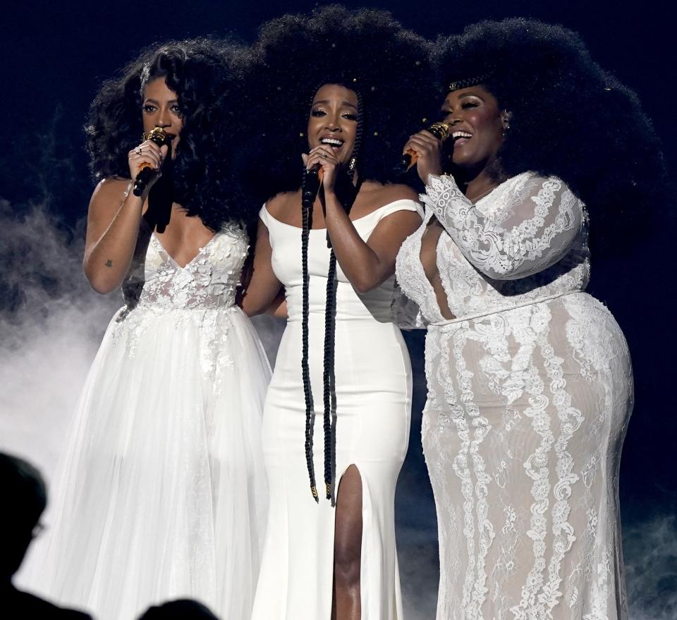 Madeline Edwards, from left, Mickey Guyton, and Brittney Spencer perform at the 55th annual CMA Awards on Wednesday, Nov. 10, 2021 - Credit: AP