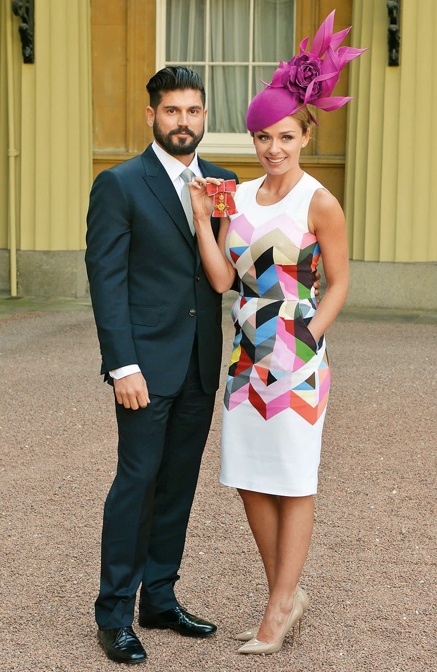 Katherine receiving her OBE in 2014, with her husband Andrew Levitas - Reuters