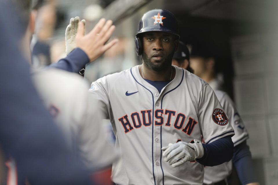 Houston Astros' Yordan Alvarez is congratulated after he scored against the New York Yankees during the fifth inning of a baseball game Thursday, May 9, 2024, in New York. (AP Photo/Frank Franklin II)