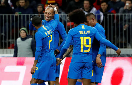 Soccer Football - International Friendly - Russia vs Brazil - Luzhniki Stadium, Moscow, Russia - March 23, 2018 Brazil’s Miranda celebrates with team mates after scoring their first goal REUTERS/Sergei Karpukhin