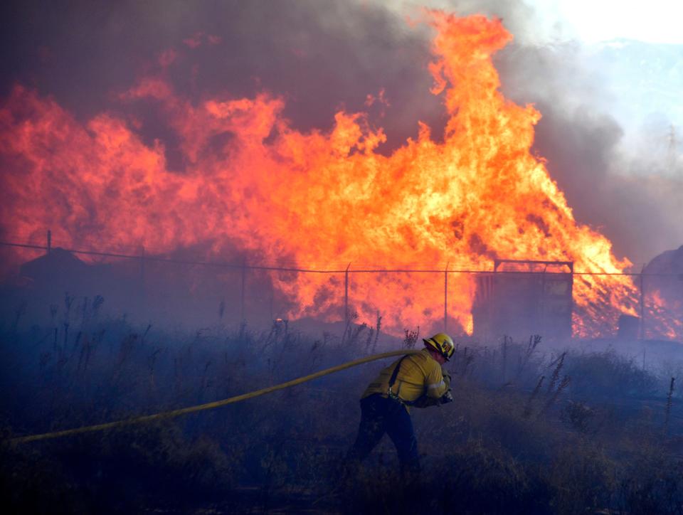Battling a wildfire in Riverside, California, on Dec. 3, 2020.