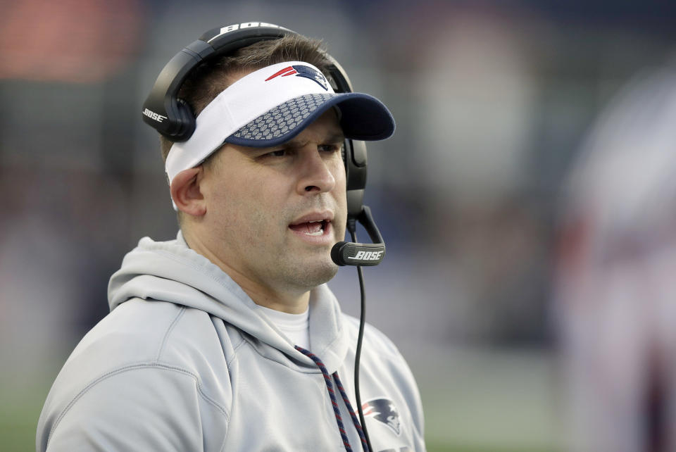 FILE – In this Jan. 21, 2018, file photo, New England Patriots offensive coordinator Josh McDaniels watches from the sideline during the first half of the AFC championship NFL football game against the Jacksonville Jaguars in Foxborough, Mass. McDaniels has backed out of a deal to become the Indianapolis’ Colts new coach, a decision that shocked the franchise hours after it announced his hiring. The Colts confirmed McDaniels’ decision in a statement Tuesday night after reports emerged that the Patriots’ offensive coordinator had opted to stay in New England with coach Bill Belichick. (AP Photo/Charles Krupa, File)