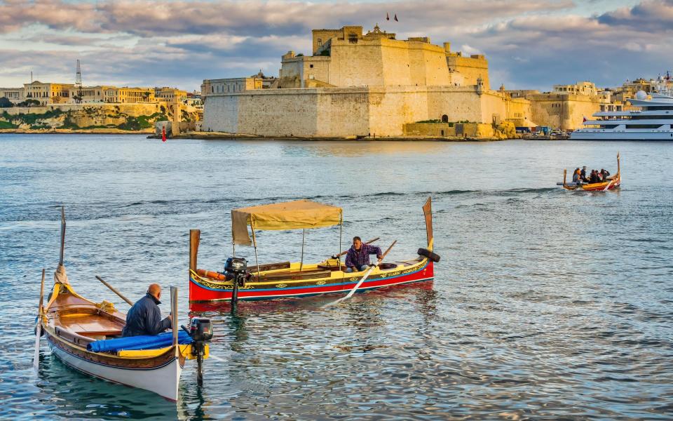 Dghajsas in Valletta's Grand Harbour - Getty