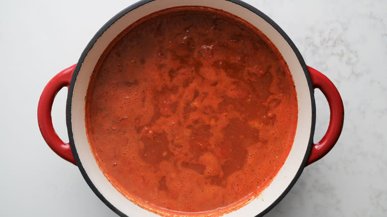 tomatoes and lentils in pot