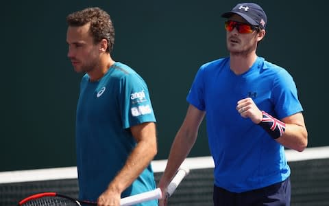 Jamie Murray of Great Britain and Bruno Soares of Brazil celebrate a point against Ryan Harrison of the United States and Max Mirnyi of Belarus in their first round doubles match during the Miami Open Presented by Itau at Crandon Park Tennis Center on March 24, 2018 in Key Biscayne, Florida - Credit: Getty Images