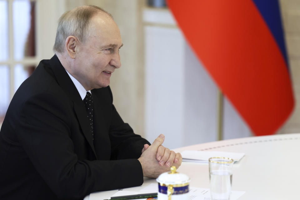 Russian President Vladimir Putin smiles as he talks with North Korea's leader Kim Jong Un during their tete-a-tete meeting in Pyongyang, North Korea, on Wednesday, June 19, 2024. (Gavriil Grigorov, Sputnik, Kremlin Pool Photo via AP)