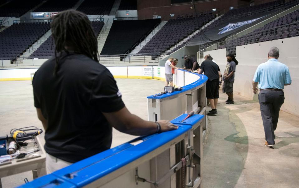 Workers prepare the Pensacola Bay Center arena for the upcoming hockey season during a training session on Thursday, Aug. 17, 2023. The Bay Center has renovated many facilities to enhance the user experience and expects to make more in the coming months.